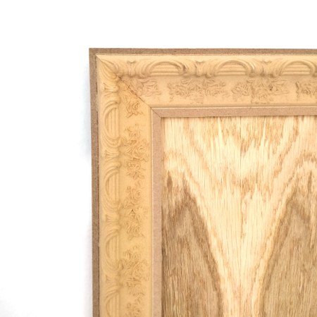 Ξυλόγλυπτη κορνίζα με το μέτρο