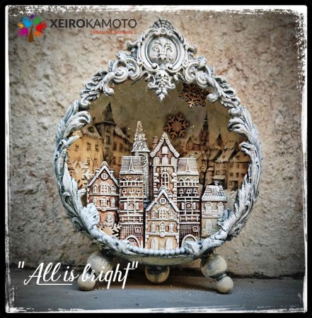 Σετ από 11 λευκά διακοσμητικά σπιτάκια και κτίρια σε διάφορα σχέδια και μεγέθη, ιδανικά για χριστουγεννιάτικη διακόσμηση.