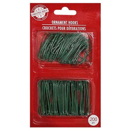 Πράσινα μεταλλικά πιαστράκια στολιδιών 4cm σε συσκευασία 200 τεμαχίων, με μία γυναίκα να διακοσμεί χριστουγεννιάτικο δέντρο.