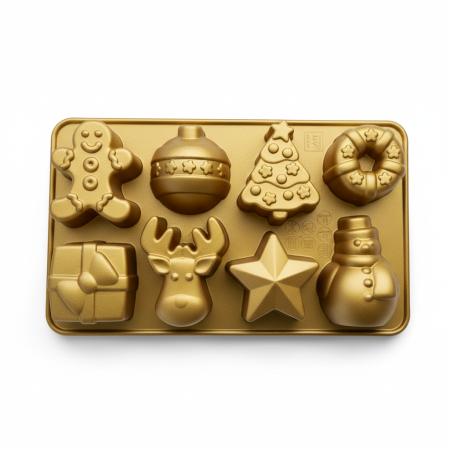Χρυσό καλούπι σιλικόνης με χριστουγεννιάτικα σχέδια όπως ανθρωπάκι gingerbread, τάρανδος, αστέρι και χριστουγεννιάτικο δέντρο.